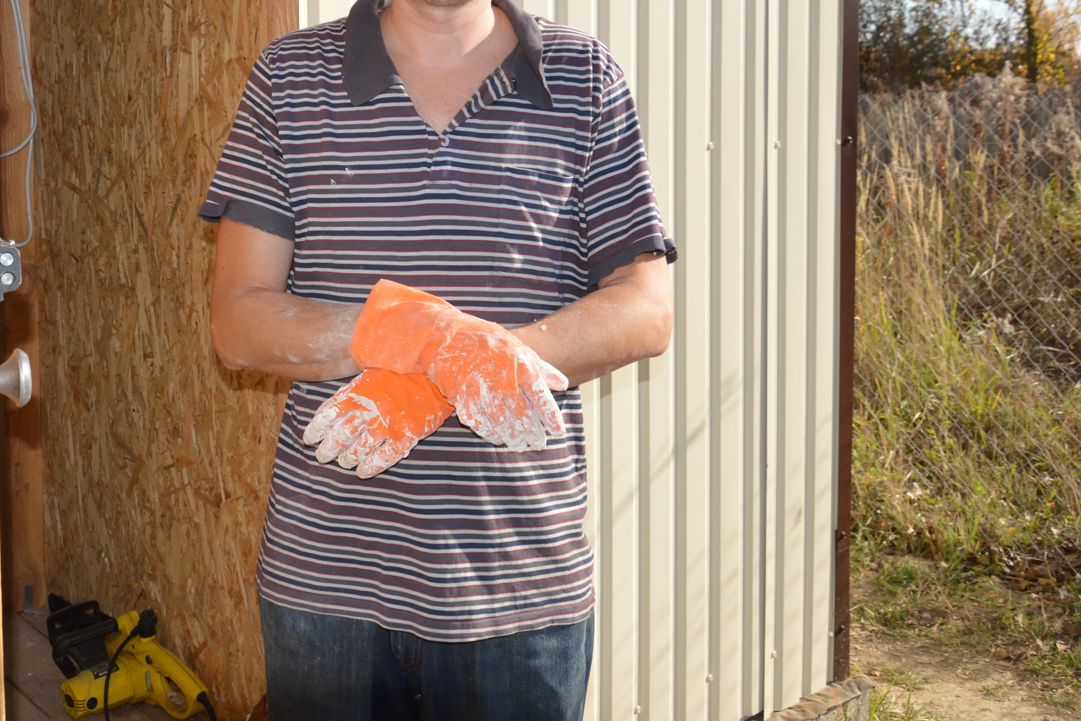 A man modeling a range of poses for the camera.